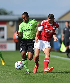 Images Dated 20th July 2013: Battling for Supremacy: Forest Green Rovers Ed Asafu-Adjaye vs. Bristol City's Derrick Williams