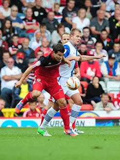 Bristol City V Blackburn Rovers Prints: Battling for Supremacy: Foster vs
