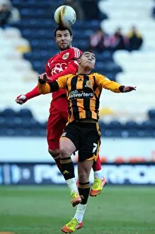 Images Dated 11th February 2012: Battling for Supremacy: Foster vs. Stewart in Hull City vs. Bristol City Championship Clash