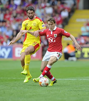 Bristol City V MK Dons Prints: Battling for Supremacy: Freeman vs. Grigg in the Intense Bristol City vs. MK Dons Clash