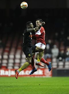 Images Dated 25th March 2014: Battling for Supremacy: Greg Cunningham vs Jennison Myrie-Williams in the Heat of Bristol City vs