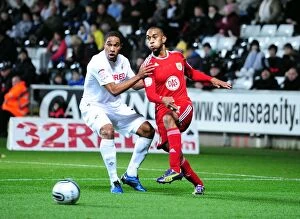 Images Dated 10th November 2010: Battling for Supremacy: Haynes vs. Williams in Swansea City vs