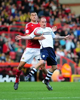 Battling for Supremacy: Hume vs. Caulker in the Championship Clash between Bristol City and Preston North End