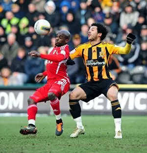 Images Dated 11th February 2012: Battling for Supremacy: Jamal Campbell-Ryce vs. Liam Rosenior in Hull City vs