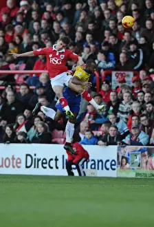 Battling for Supremacy: Joe Bryan's Aerial Clash in Bristol City vs Crawley Town