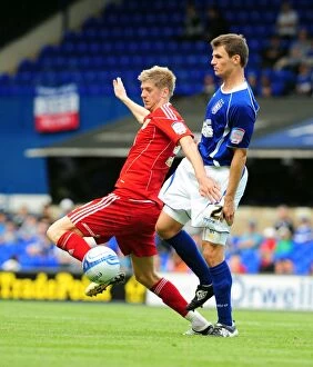 Images Dated 28th August 2010: Battling for Supremacy: Jon Stead vs. Tommy Smith in the 2010 Championship Clash between Ipswich