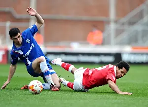 Bristol City V Gillingham Prints: Battling for Supremacy: Korey Smith vs John Egan in Intense Bristol City vs Gillingham Clash