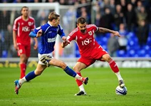 Images Dated 3rd March 2012: Battling for Supremacy: Liam Fontaine vs. Lee Martin in Ipswich Town vs