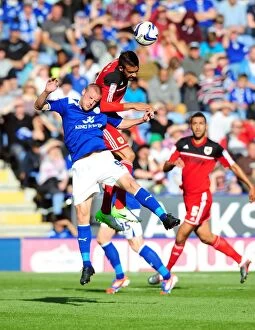Images Dated 6th October 2012: Battling for Supremacy: Liam Fontaine vs. Jamie Vardy in Leicester City vs