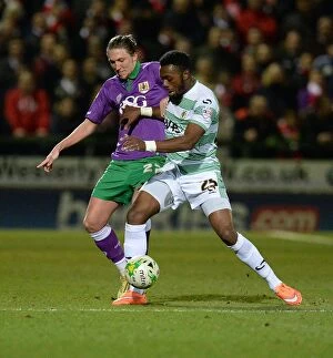 Images Dated 10th March 2015: Battling for Supremacy: Luke Ayling vs Gozie Ugwu in Yeovil Town vs Bristol City Football Match