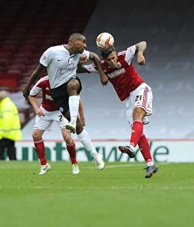 Images Dated 14th September 2013: Battling for Supremacy: Marlon Pack vs. Tyrone Barnett in the Sky Bet League One Clash between