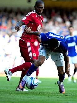 Images Dated 28th August 2010: Battling for Supremacy: Marvin Elliott vs. Carlos Edwards in the Championship Clash between