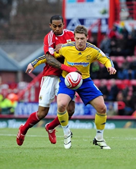 Bristol City V Derby County Prints: Battling for Supremacy: Marvin Elliott vs