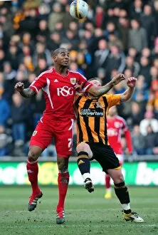 Images Dated 11th February 2012: Battling for Supremacy: Marvin Elliott vs. Paul McKenna in Hull City vs