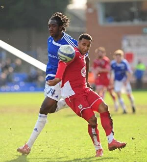 Peterborough v Bristol City Collection: Battling for Supremacy: Maynard vs. Geohaghon in the Intense Championship Clash, March 2010