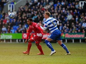 Images Dated 13th March 2010: Battling for Supremacy: Maynard vs. Mills in the Championship Clash between Reading