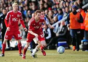 Images Dated 18th February 2012: Battling for Supremacy: Pearson vs. Taylor in Peterborough United vs. Bristol City Football Clash