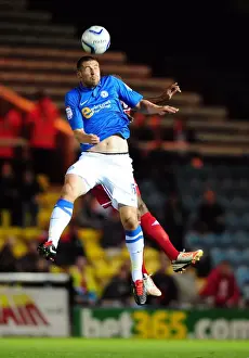 Battling for Supremacy: Peterborough United's Michael Bostwick vs