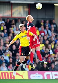 Images Dated 22nd September 2012: Battling for Supremacy: Ryan Taylor vs. Neuton in the Championship Clash between Watford