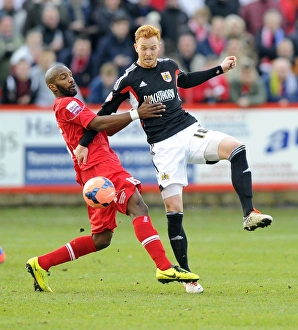 Battling for Supremacy: Ryan Taylor vs. Duane Courtney in FA Cup Clash