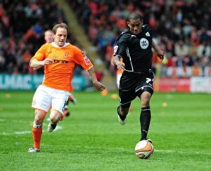 Images Dated 2nd May 2010: Battling for Supremacy: Vaughan vs. Elliott in the 2010 Championship Clash between Blackpool