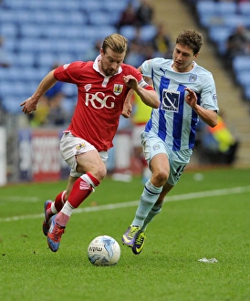 Coventry City V Bristol City Prints: Battling for Supremacy: Wade Elliott vs