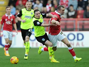 Battling for Supremacy: Wilbraham vs Jones in the Intense Bristol City vs Oldham Athletic Clash, Sky Bet League One, 2014