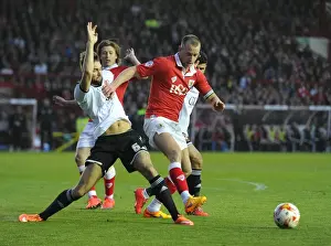 Battling for Supremacy: Wilbraham vs Turnbull in the Heated Rivalry of Bristol City vs Swindon Town (April 2015)