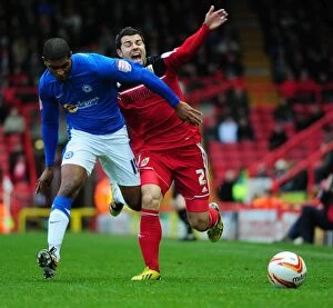 Images Dated 29th December 2012: Battling Wings: A Championship Showdown - Foster vs. Little (Bristol City vs. Peterborough)