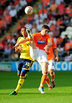 Blackpool V Bristol City Prints: Blackpool's Craig Cathcart Clears Under Pressure from Nicky Maynard in League Cup Clash with Bristol City