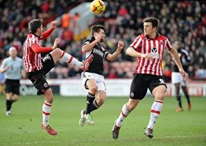 Images Dated 22nd February 2014: Bob Howard Clears Under Pressure: Sheffield United vs. Bristol City, 2014