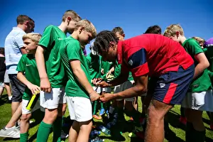 Framed Print : Bobby Reid of Bristol City Signs Autographs for Guernsey Mascots (Guernsey FC vs. Bristol City, Pre-season Friendly)