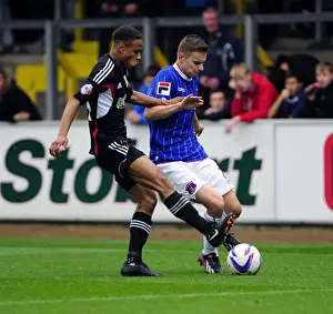 Carlisle United V Bristol City Prints: Bobby Reid Closes In: Intense Moment as Bristol City Star Confronts Carlisle United's Conor Townsend