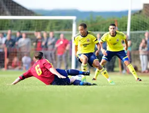 Bobby Reid Nimbly Evades a Challenge: Ashton and Backwell United vs. Bristol City (Pre-Season Friendly)