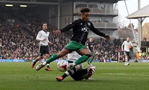 Images Dated 12th March 2016: Bobby Reid Tackled in Fulham vs. Bristol City Championship Clash