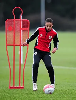 Bobby Reid in Training: Focused Footballer of Bristol City