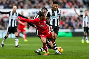 Newcastle United V Bristol City Prints: Bobby Reid vs Ciaran Clark: Intense Battle at St James Park (Newcastle United vs Bristol City)