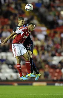 Round 2 Prints: Bobby Reid vs. Stuart O'Keefe: Intense Battle for the High Ball in Bristol City vs