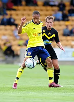 Torquay V Bristol City Prints: Bobby Reid's Determined Struggle for Possession: Torquay vs. Bristol City