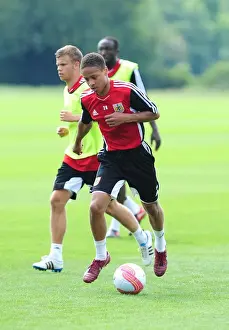 Framed Print : Bobby Reid's Relentless Determination: Pre-Season Training with Bristol City