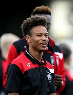 Glanford Park Prints: Bobby Reid's Smile: Bristol City's Arrival at Glanford Park for EFL Cup Clash with Scunthorpe United