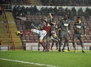Images Dated 14th December 2013: Bobby Reid's Unstoppable Cross: Bristol City's Victory Over Rotherham United (14/12/2013)