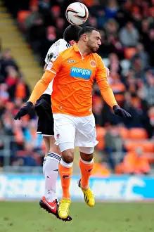 Black Pool Prints: Brendan Maloney vs Matt Phillips: Intense Clash at Bloomfield Road