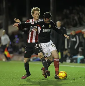 Brentford V Bristol City Prints: Brentford vs. Bristol City: Intense Battle Between George Saville and Greg Cunningham
