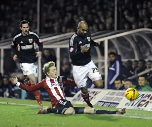 Brentford V Bristol City Prints: Brentford vs. Bristol City: Marvin Elliott Tackled by George Saville