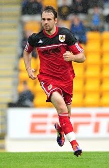 Images Dated 28th July 2012: Brett Pitman in Action: A Football Rivalry Ignites at McDiarmid Park, 2012