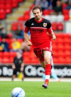 St Johnstone V Bristol City Prints: Brett Pitman in Action: A Football Rivalry Unfolds at McDiarmid Park (2012)