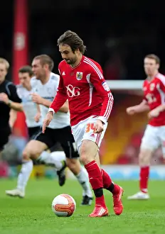 Framed Print : Brett Pitman of Bristol City Faces Off Against Derby County at Ashton Gate Stadium, 2012