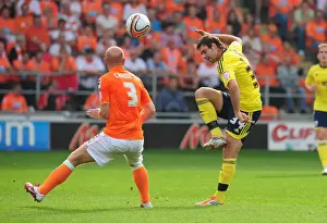 Blackpool V Bristol City Prints: Brett Pitman Lifts Ball Over Stephen Crainey: Blackpool vs. Bristol City, League Cup 2011