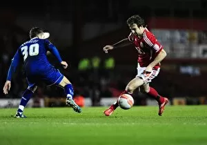 Images Dated 6th March 2012: Brett Pitman vs Leicester City: A Fierce Face-off at Ashton Gate Stadium, 2012